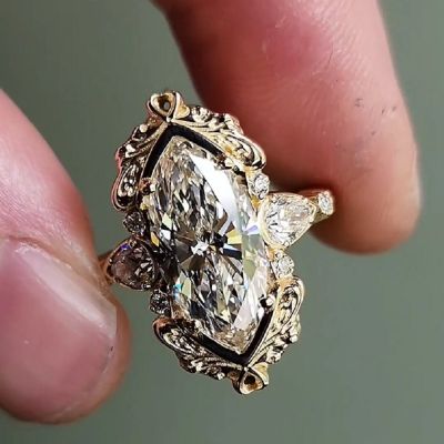 2.72Carats Marquise Diamond Engagement Ring with Pear Side Stones And Gold Scrollwork